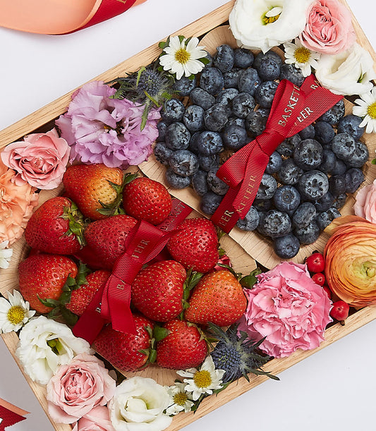 Premium wooden gift box with fresh blueberries, strawberries, and mixed roses and carnations