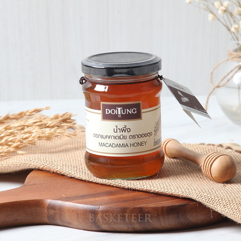 Amber DoiTung macadamia honey in glass jar with wooden dipper, luxe gift hamper essential