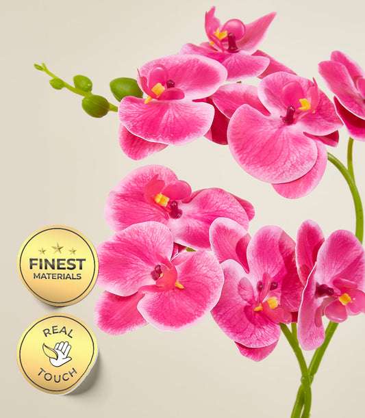 Vibrant pink artificial orchids with fuchsia petals in premium potted arrangement
