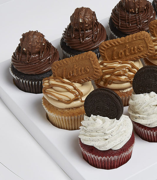 Charlotte Bakery artisan cupcakes: chocolate ganache, Lotus biscuit, and Oreo cream cheese frosting. Order a custom cake Bangkok selection!
