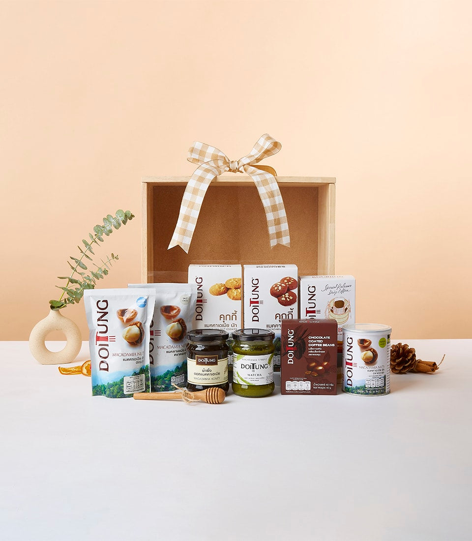 Exquisite Doi Tung Crafts gift box with macadamia nuts, honey, matcha, cookies, and artisan treats