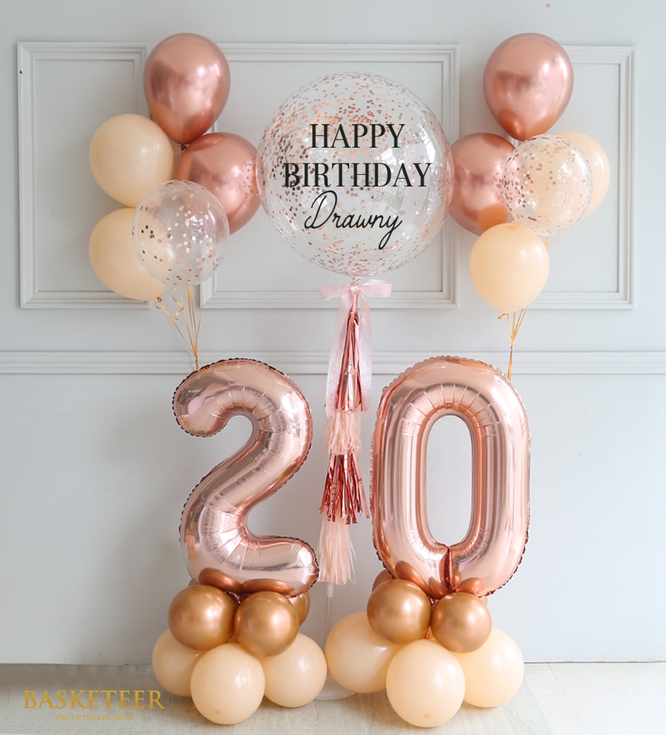 Rose gold number balloons with confetti bubble and peach latex balloon bouquets for birthday celebration