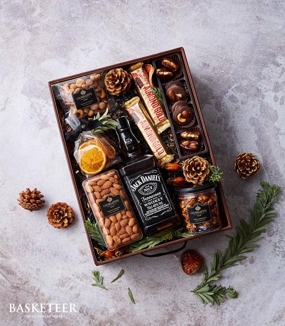 Premium whisky gift box with Jack Daniel's, almond chocolate, and gourmet nuts