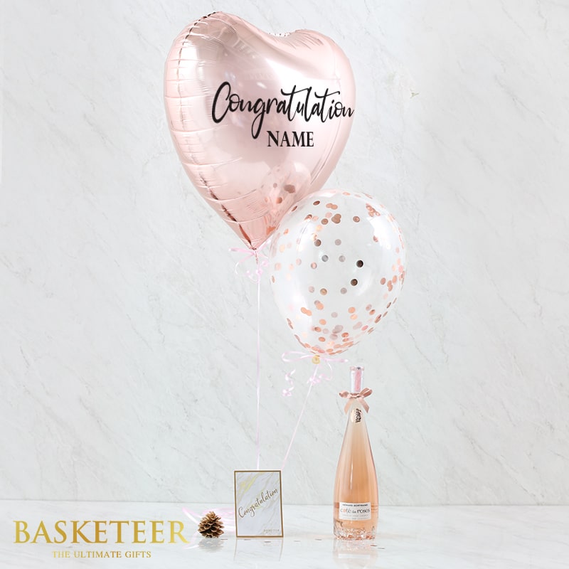 Rose gold heart balloon and rosé wine celebration gift set with confetti balloons and congratulations card