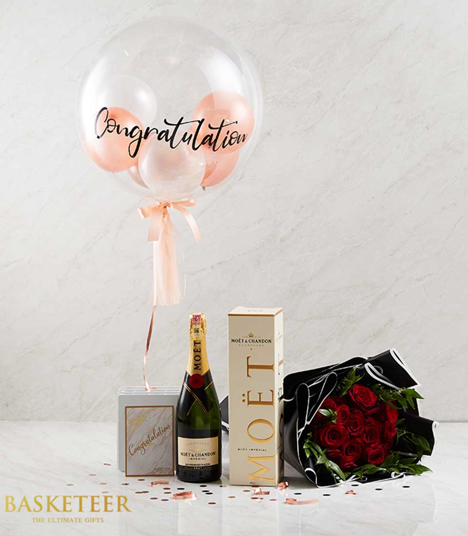 Moët Champagne, red roses, and congratulations balloon gift set with rose gold confetti