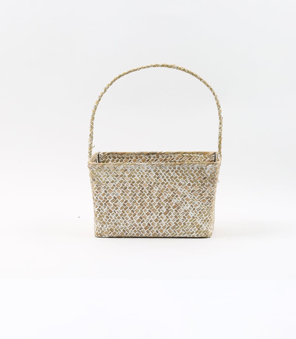 Natural woven seagrass basket with arched handle, tan and cream two-tone weave