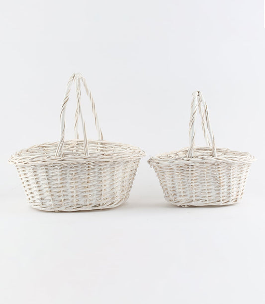White woven oval baskets with handles, empty and ready for luxury gifting
