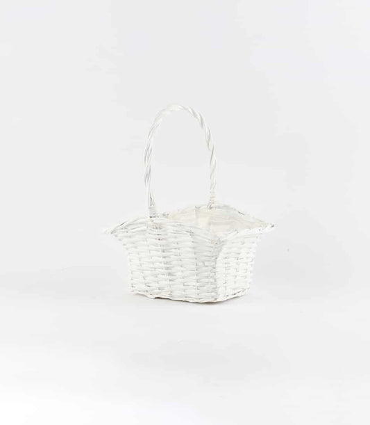 White woven wicker gift basket with twisted handle and fabric lining