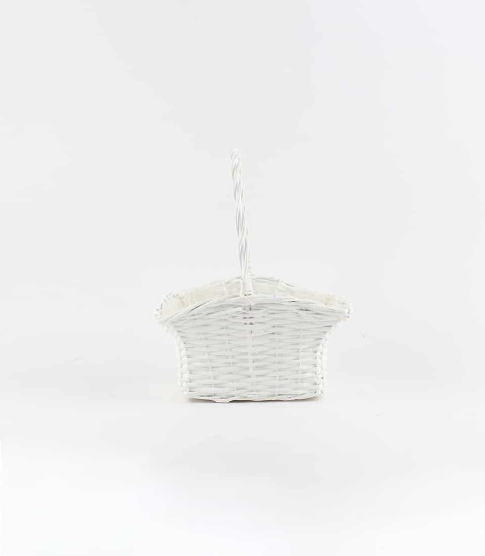 White wicker gift basket with twisted handle and cream fabric lining