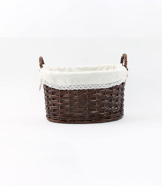 Dark brown woven wicker gift basket with cream linen and lace trim, ready to fill