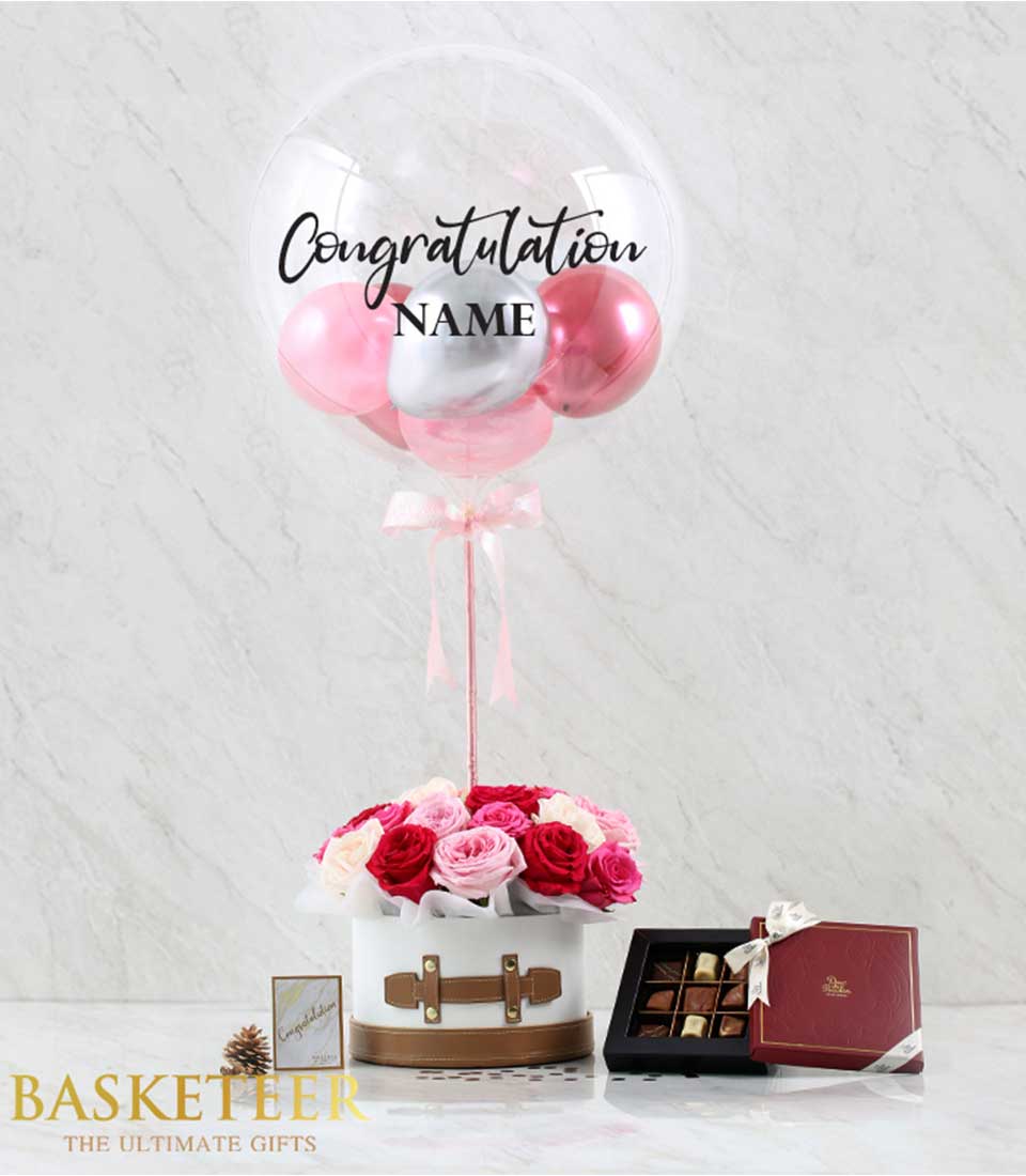 Sweet Flowers Chocolate Balloon Box with red and pink roses, personalized bubble balloon, and artisan chocolates for