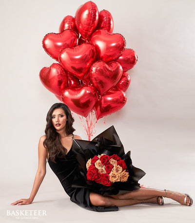 Luxury red rose and peach rose bouquet with floating red heart balloons, romantic Valentine's Day gift set
