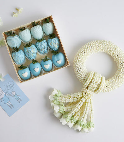 Luxury chocolate-covered strawberries with jasmine garland and Mother's Day greeting card, artisan gift set