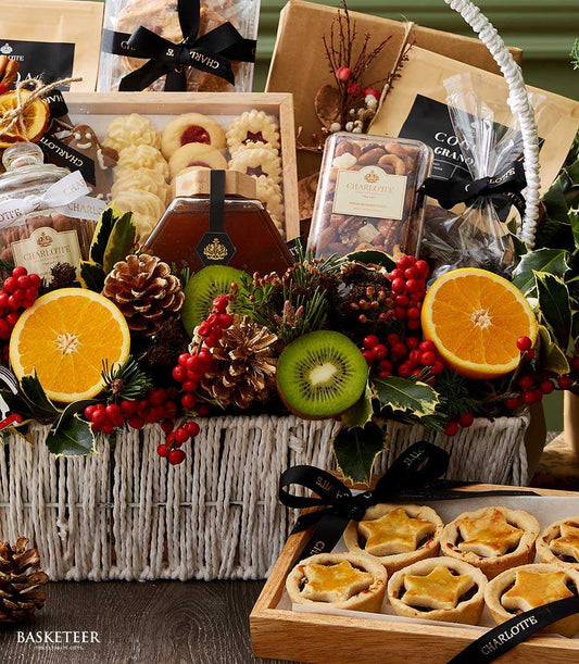 Luxury Yuletide Treats Hamper with gourmet honey, artisan cookies, and festive pine and berry garnish