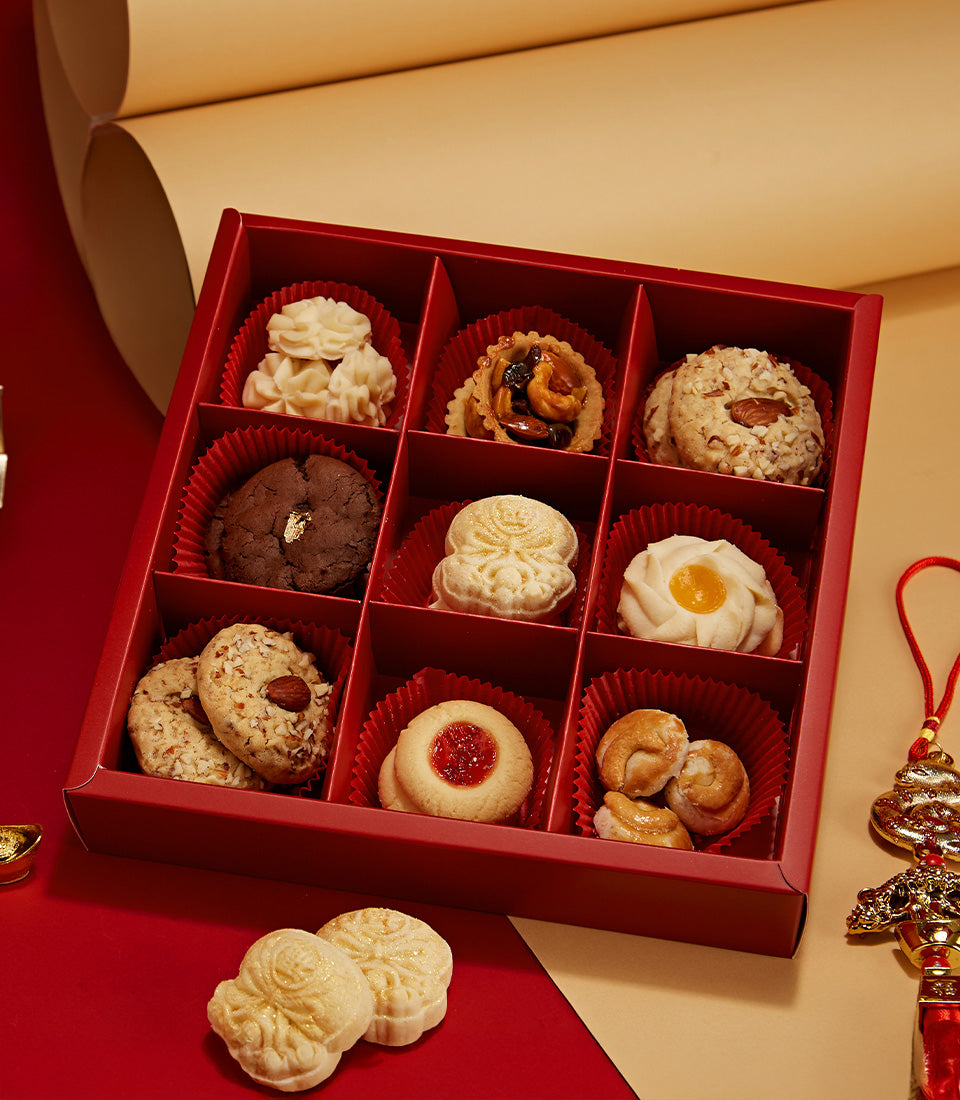 Chinese New Year assorted cookies gift box with nine artisan pastries in red fluted cups