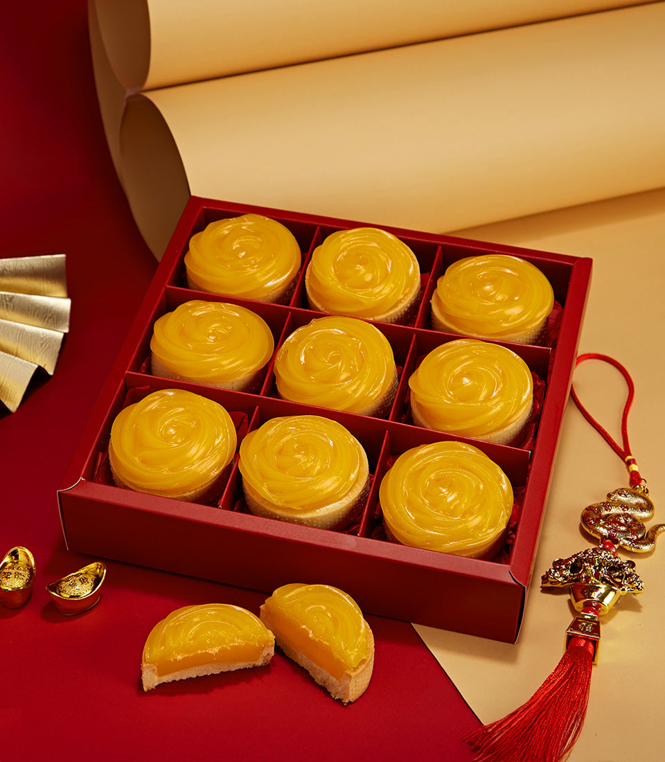 Mandarin orange tarts with rose-shaped fruit topping in red CNY gift box, nine artisan pastries for Chinese New Year