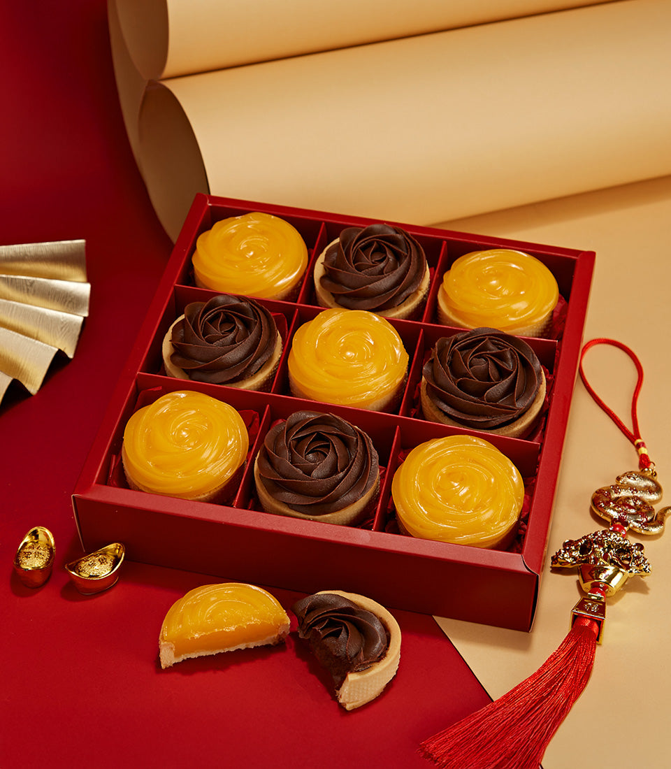Red gift box with citrus and chocolate rose tarts, Chinese New Year bakery hamper with golden accents