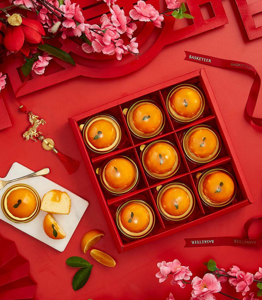 Golden Fortune Mandarin Chiffon cake gift set with nine individual cakes, fresh citrus, and red silk ribbon for Chinese New
