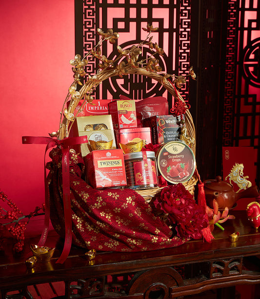 Golden Fortune gourmet gift basket with tea, chocolates, and premium treats in red and gold packaging for Chinese New Year