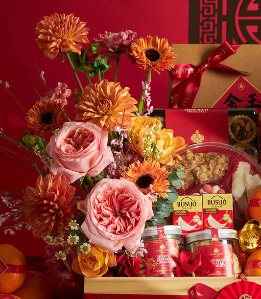 Luxury Chinese New Year gift basket with pink roses, orange dahlias, gourmet cookies, bird's nest drinks, and fresh