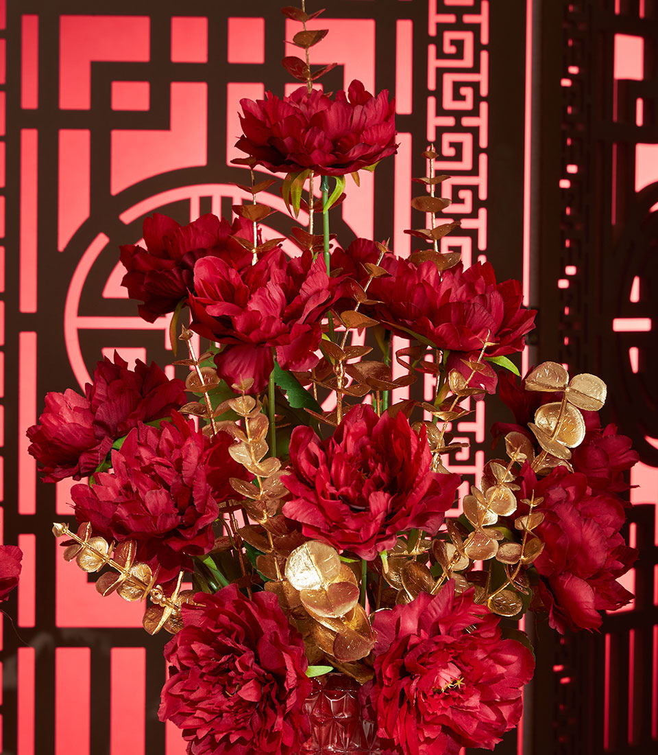 A Basketeer luxury gift for Chinese New Year: artificial red peonies with gold accents, a beautiful premium hamper for Bangkok delivery.