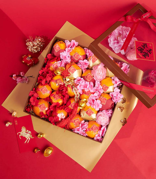 Premium mandarin orange gift box with gold ingots and red silk flowers for Chinese New Year celebration