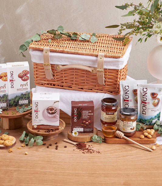 Premium wicker gift hamper with DoiTung macadamia nuts, artisan coffee, honey, and chocolate treats