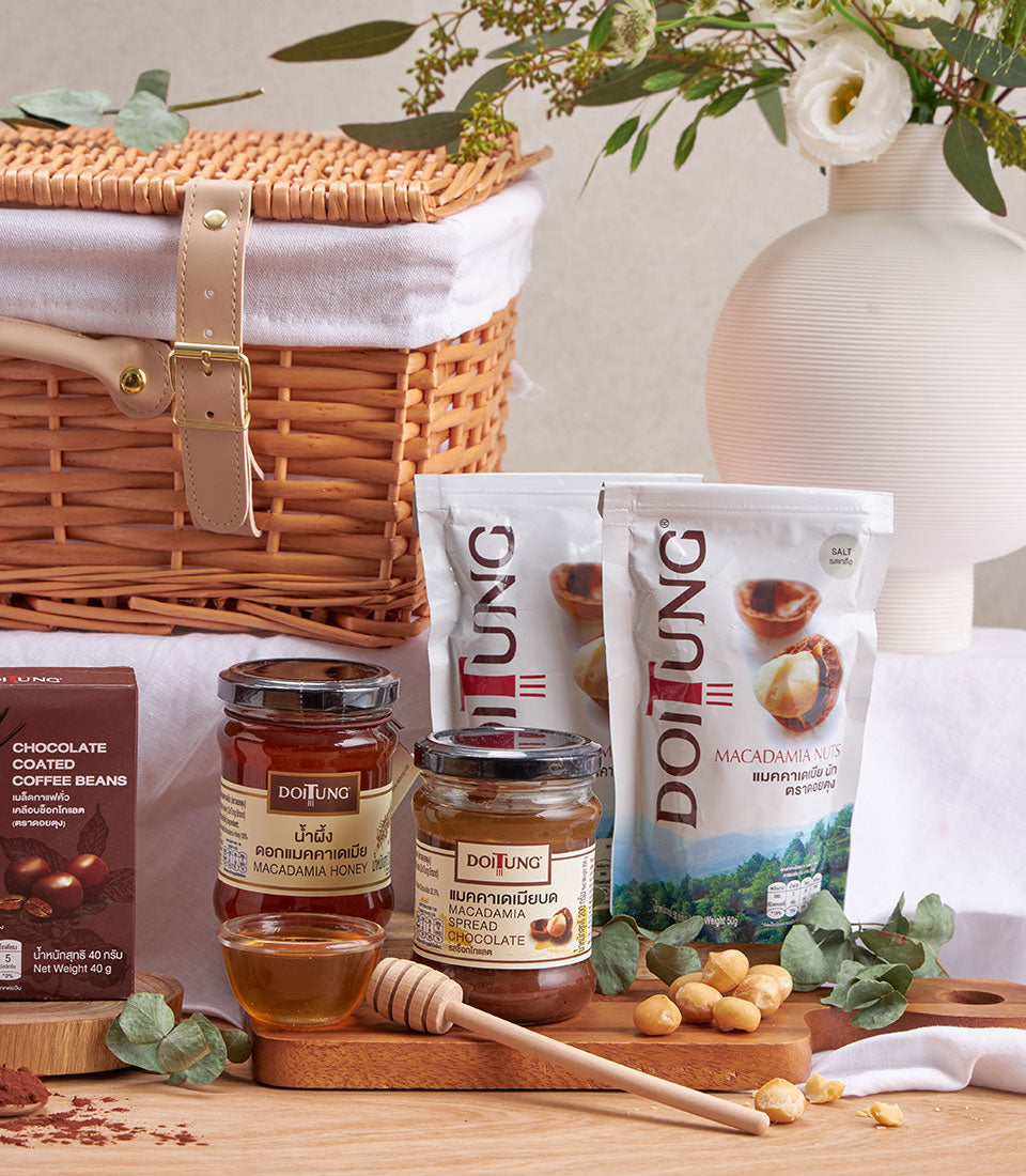 Premium DoiTung macadamia and coffee gourmet gift hamper with nuts, honey spread, chocolate beans in woven basket