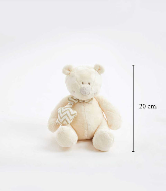 Cream plush teddy bear with chevron patterned bow and star charm, newborn gift
