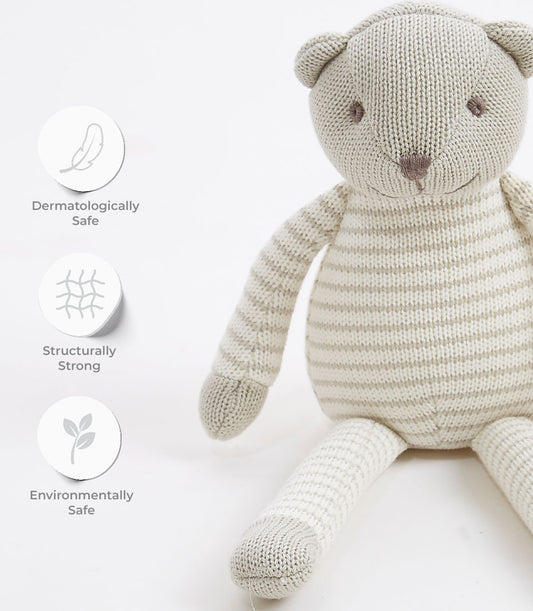 Gray-striped knitted teddy bear with embroidered face, dermatologically safe soft toy for babies and children