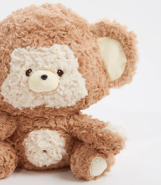 Soft brown plush monkey toy with cream accents, perfect for babies and children