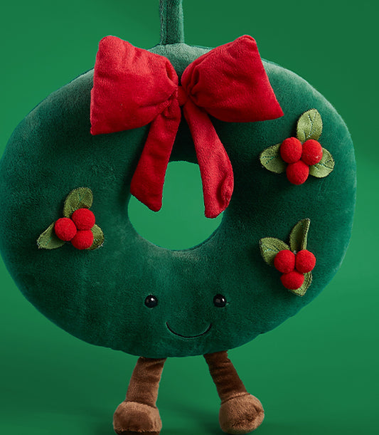 Soft green plush Christmas wreath toy with red bow and berry details, festive Basketeer gift for holiday decor