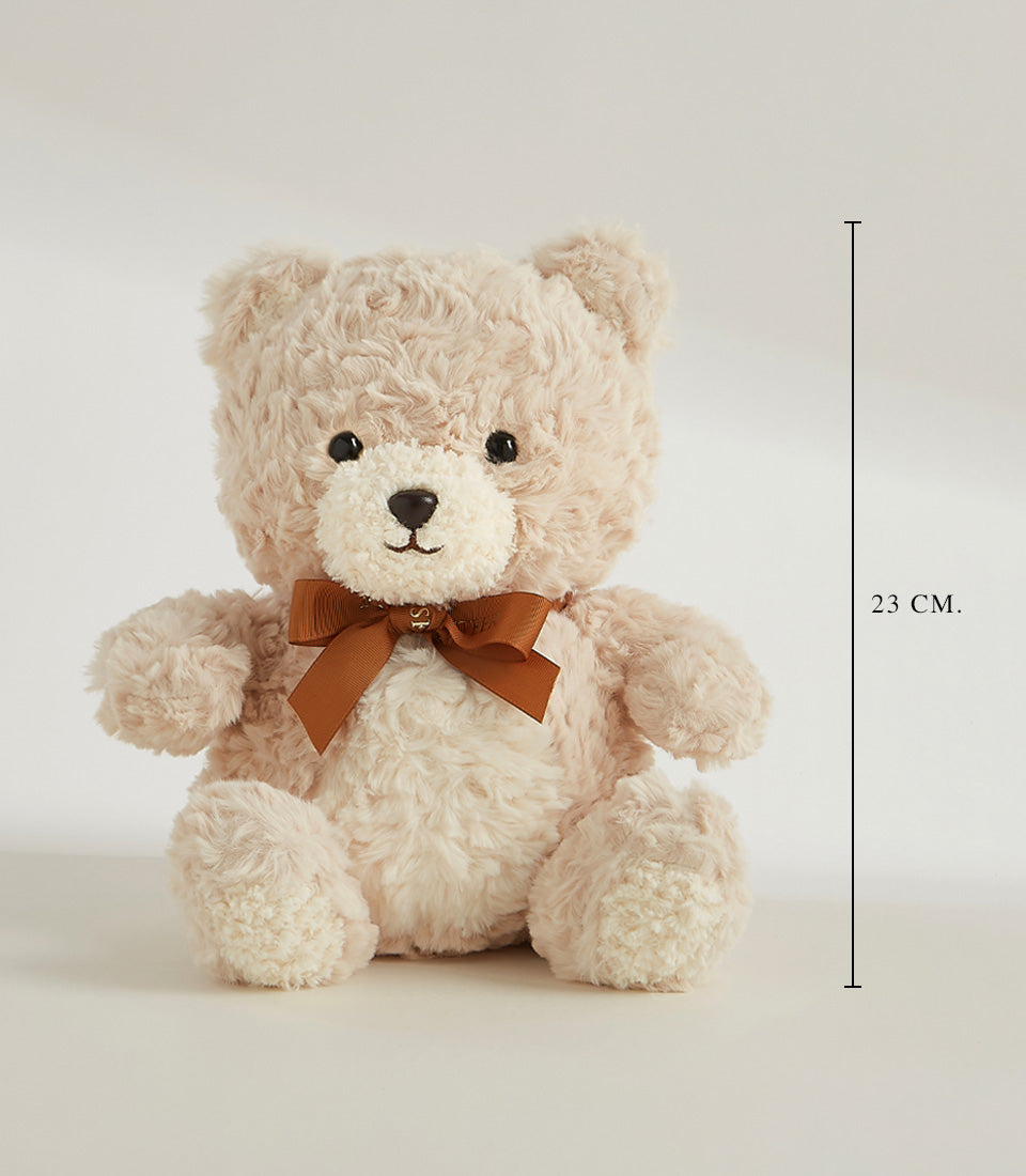 Light beige plush teddy bear with satin ribbon bow and charm, 23cm height