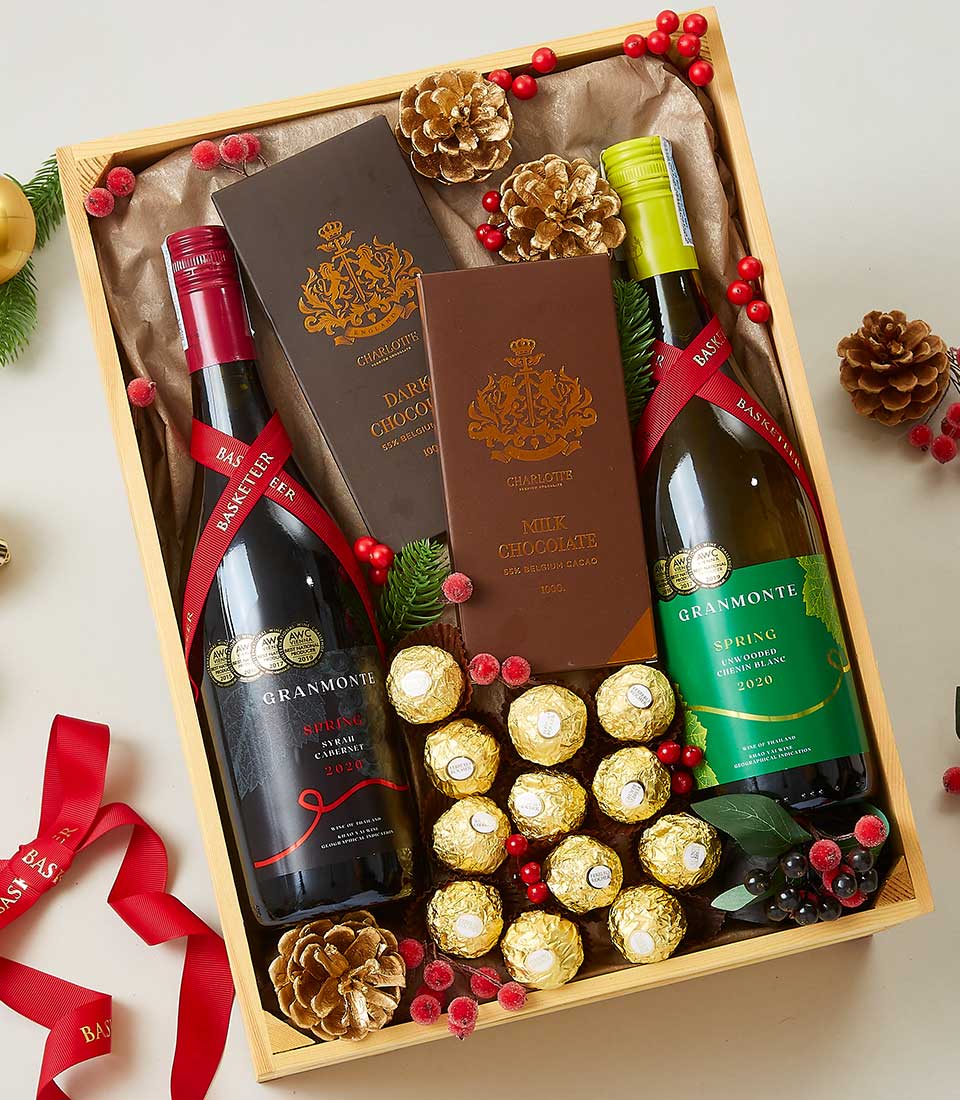 Premium wine and chocolate gift set with red and white GranMonte bottles, Charlotte artisan chocolates, and Ferrero Rocher