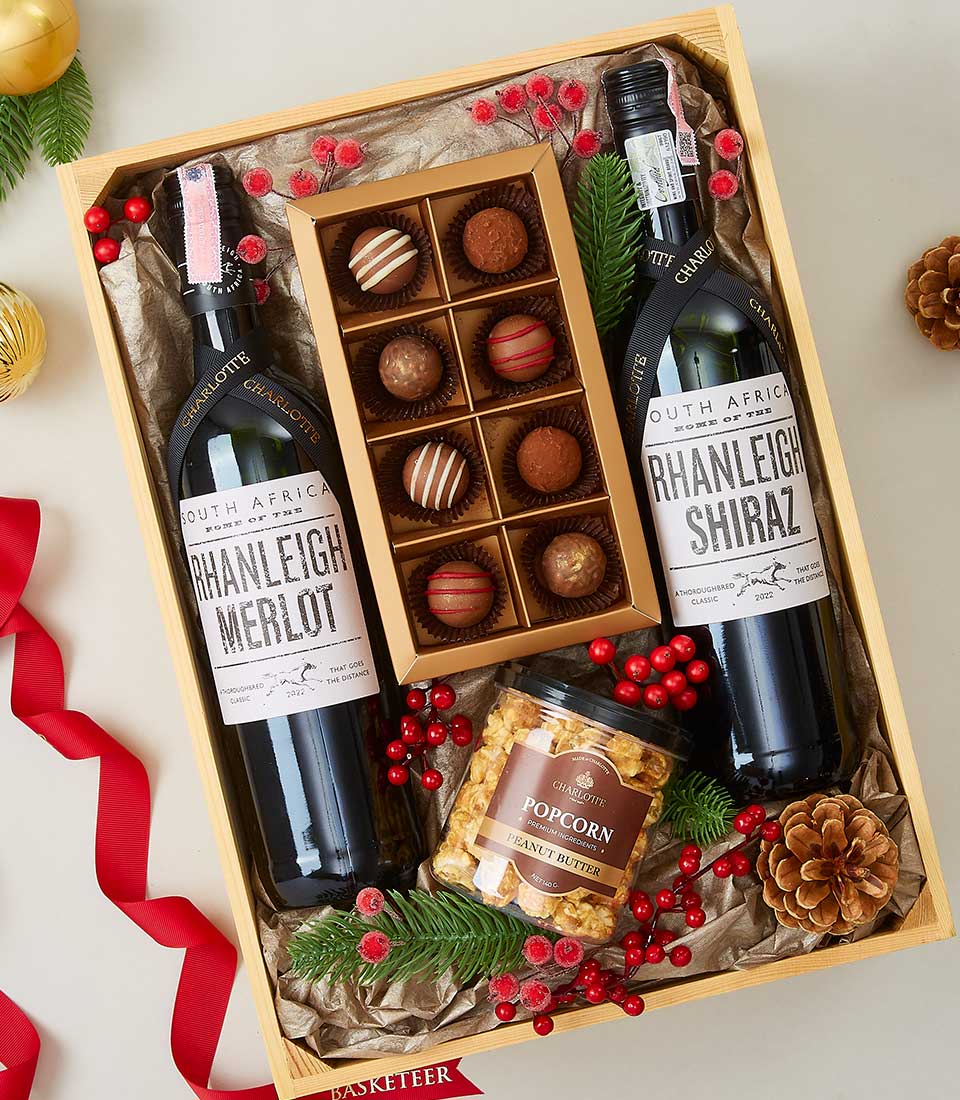 Rhanleigh Merlot and Shiraz wine gift hamper with chocolate truffles and gourmet popcorn in wooden crate