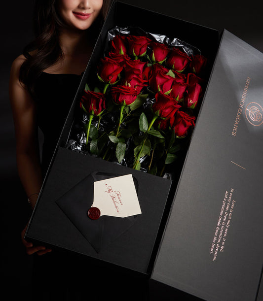 Luxe red rose bouquet from Flowers by Basketeer, presented in an elegant black gift box for flower delivery Bangkok. Perfect for same-day flower delivery.