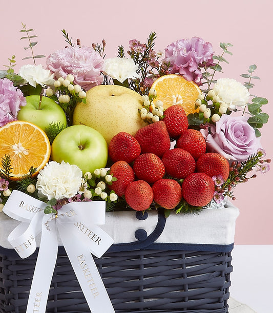 Deluxe purple flower and red strawberry gift basket with fresh fruits and roses in grey woven basket, birthday hamper