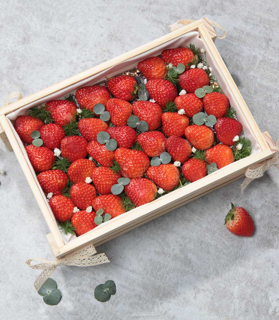 Fresh strawberry gift box with lace ribbons, premium fruit hamper for artisan gifting