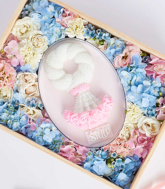 Jelly Malai Mother's Day gift box with traditional Thai garland, fresh roses and hydrangeas in pastel wooden display