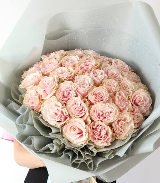 Light pink rose bouquet with grey wrapping, fresh Ecuador roses for anniversary gifts