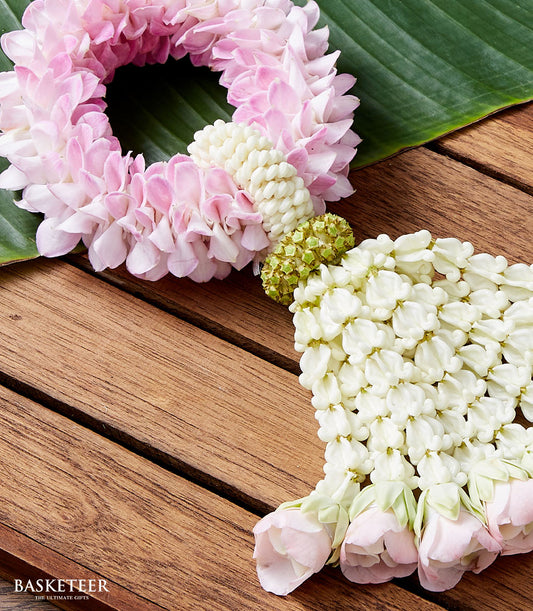 Pink orchid and white jasmine Thai flower garland for Songkran celebration