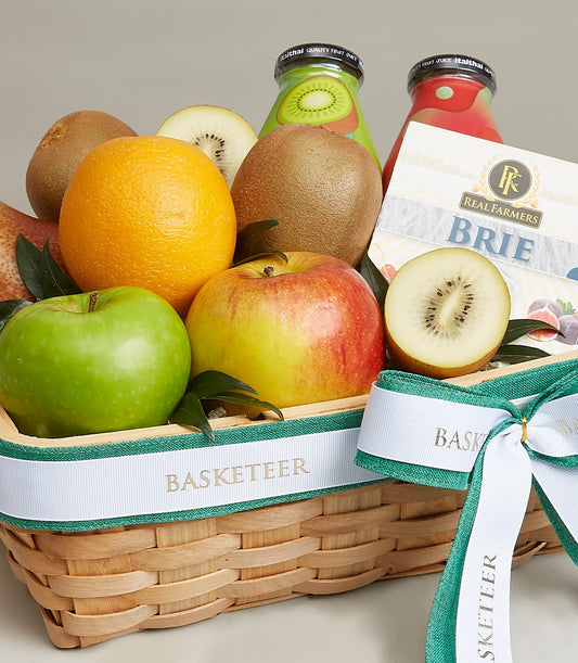 Woven basket gift box with fresh kiwis, apples, orange, artisan Brie cheese, and fruit juices