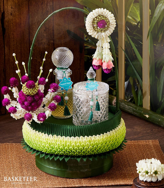 Thai Heritage Songkran perfume set with scented water, perfumed powder, and traditional green fabric tiered display