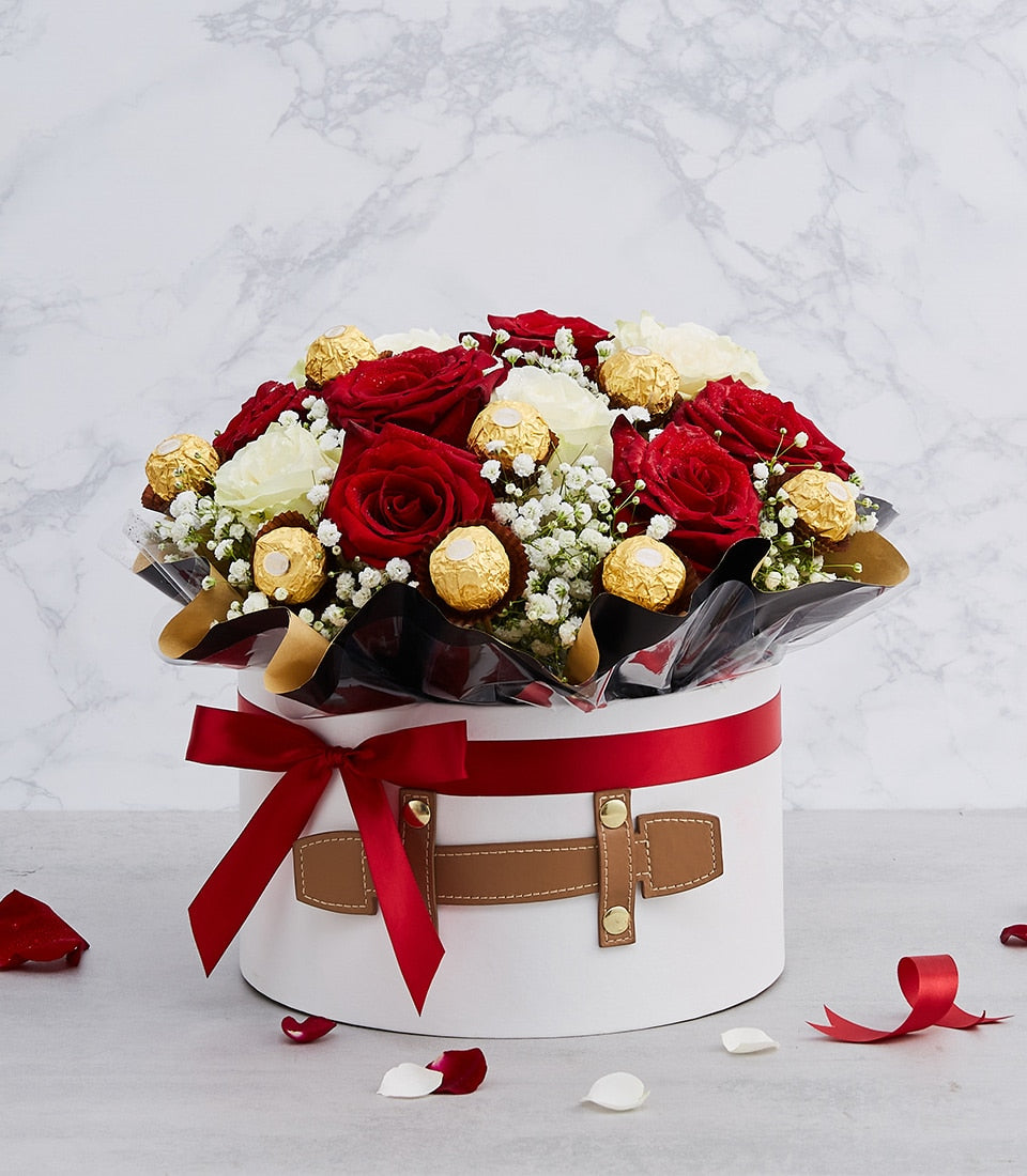 Luxury red and white rose bouquet with Ferrero Rocher chocolates in white hatbox with red ribbon