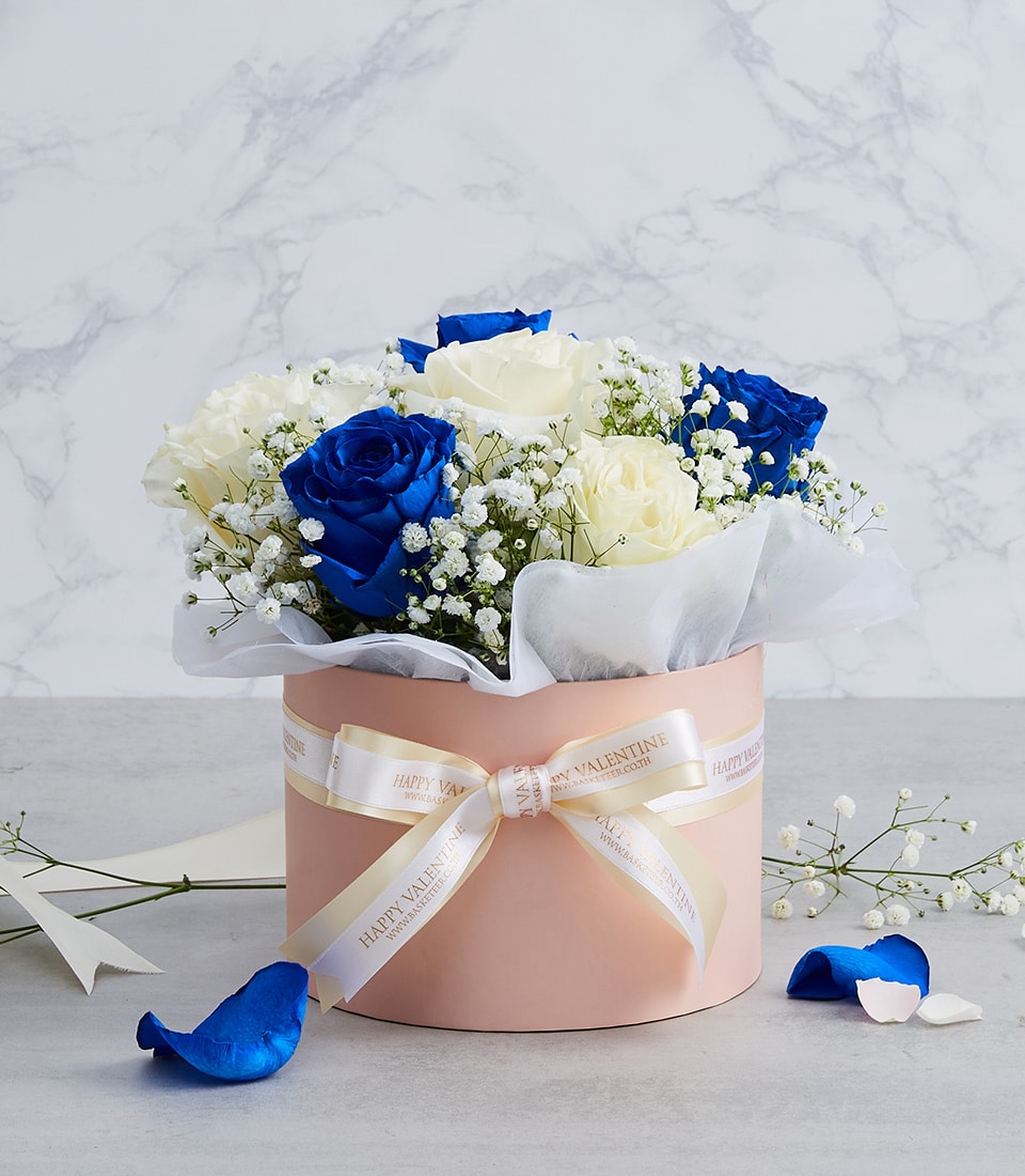 Blue and white rose arrangement in pink hatbox with baby's breath, Valentine's Day gift box