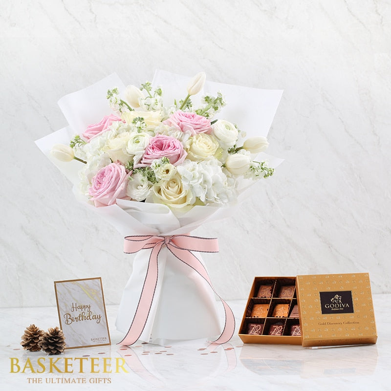 Luxury pink and white rose bouquet with assorted chocolates, birthday gift combo on marble