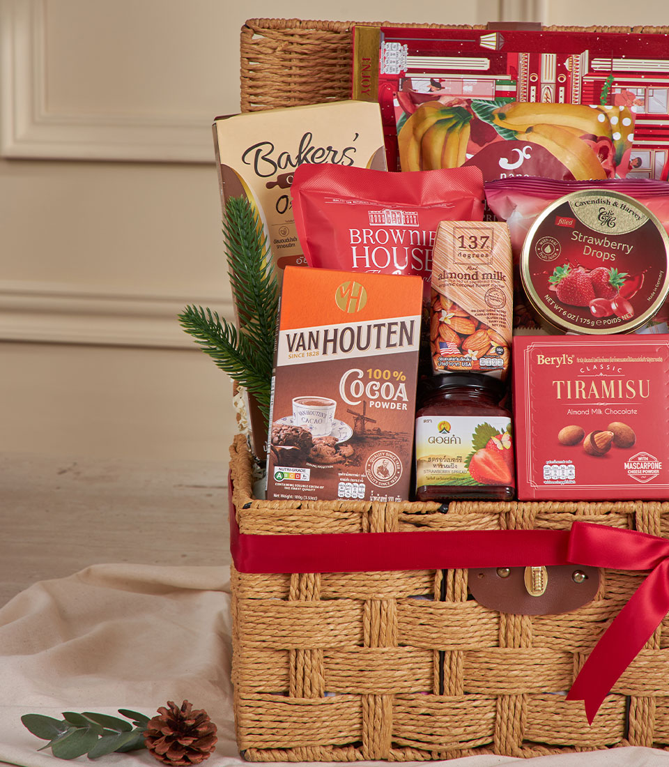 Premium red ribbon woven gift basket with gourmet snacks and treats for New Year celebrations
