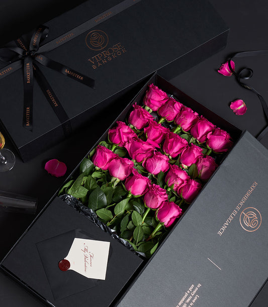 Luxury Valentine gift box with eighteen vibrant pink Ecuadorian roses, black silk ribbon, and personalized love card