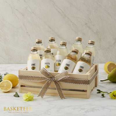 Premium hydration gift crate with Japanese fruit beverages, fresh lemons and pear, get well wellness hamper
