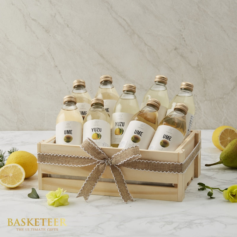 Premium hydration gift crate with Japanese fruit beverages, fresh lemons and pear, get well wellness hamper